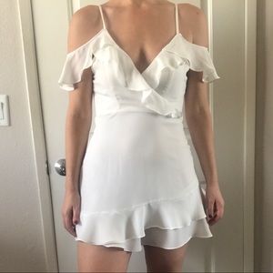 White ruffle mini dress